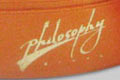 Фирменная лента логотип для туристической компании Philosophy group. 
Атласная лента с логотипом, ширина 20 мм, номер ленты 095, нанесение - логотип компании Philosophy group, тиснение золотой фольгой, город Киев