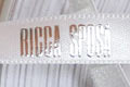 Брендированная лента с печатью логотипа для компании Ricca Sposa, цвет ленты - белый (номер ленты 001), цвет краски - серебро, ширина ленты - 10 мм, город Чернигов.
