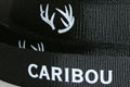 Брендированна репсовая лента с печатью логотипа для компании Caribou, цвет ленты - черный, цвет краски - белый, ширина ленты - 20 мм, город Киев.