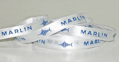 Брендированная лента с логотипом нанесенным шелкотрафаретной печатью для компании Marlin, цвет ленты - белый, цвет краски - синий, ширина ленты - 12 мм, город Киев